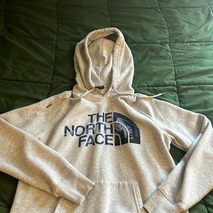 Grey northface hoodie never worn